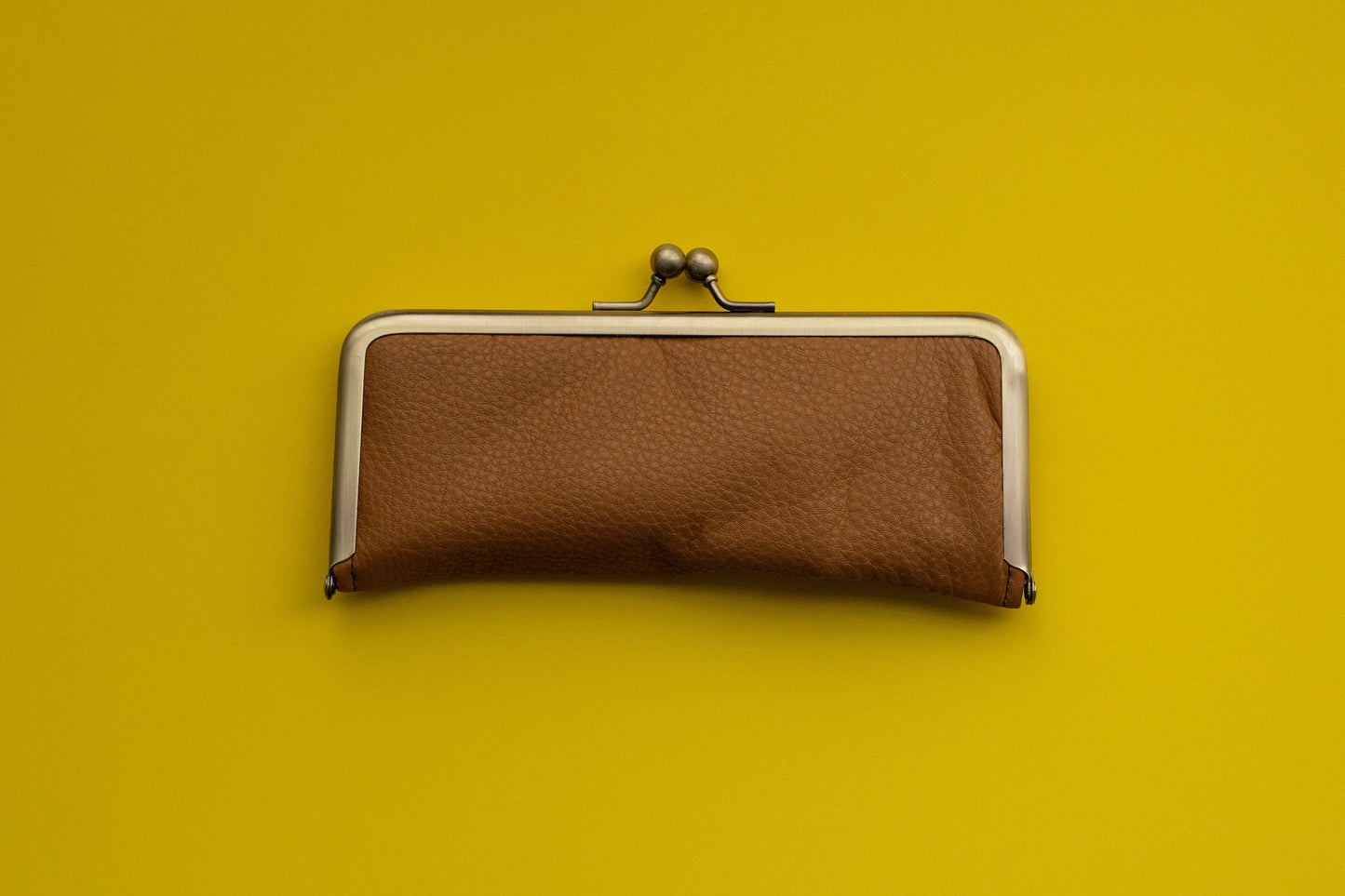 Soft to the touch. RUNO & DUNN clasp pen case