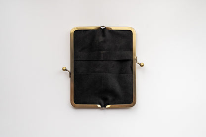 Soft to the touch. RUNO &amp; DUNN clasp pen case